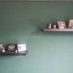 Installed floating shelves without drilling